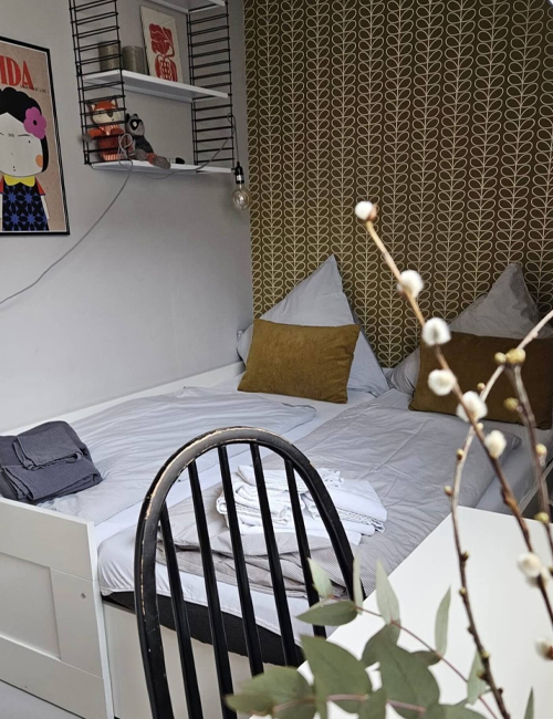 Rauszeit SPO - Ferienhaus in Sankt Peter-Ording - zweites Schlafzimmer mit Bett zum Ausklappen